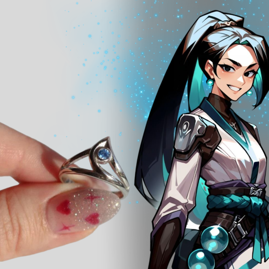 O Anel Sage da Rooxia é mais do que uma joia; é uma homenagem à icônica personagem Sage de Valorant. Ao usar o Anel Sage, você leva consigo a essência de coragem e equilíbrio, inspirada por uma personagem que simboliza força e serenidade em qualquer situação.